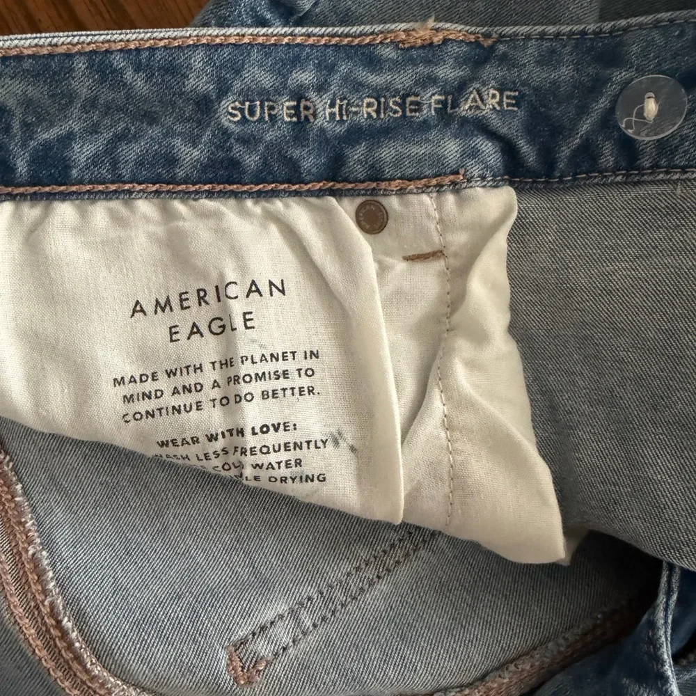American Eagle Outfitters Light Blue Distressed Flare Jeans - Picture 5 of 8